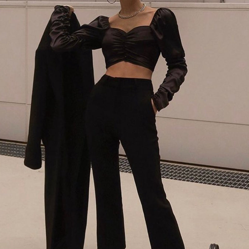 NOIRÉ | Top satinado elegante